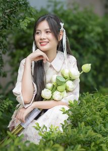 Elegant Vietnamese Woman with Pure Lotus Flowers-7