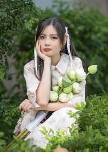 Elegant Vietnamese Woman with Pure Lotus Flowers-6