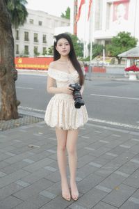 Graceful Woman in White Floral Dress Amidst Serene Summer Nature-2