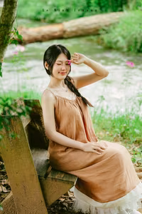 XVG No.46: Discover Natural Beauty: Young Woman in Linen Dress by a Serene Stream, a Moment of Pure Tranquility.-0