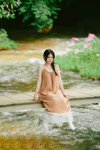 XVG No.46: Discover Natural Beauty: Young Woman in Linen Dress by a Serene Stream, a Moment of Pure Tranquility.-2