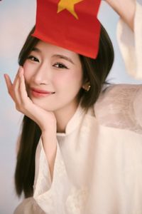 Hot girl Linh Kul in traditional Ao Dai with Vietnamese flag shares beautiful peace message for National Day 2/9-2