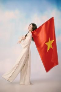 Hot girl Linh Kul in traditional Ao Dai with Vietnamese flag shares beautiful peace message for National Day 2/9-6
