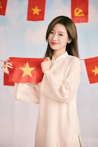 Hot girl Linh Kul in traditional Ao Dai with Vietnamese flag shares beautiful peace message for National Day 2/9-3