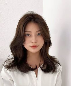 Elegant Pretty Girl with Beautiful Natural Curtain Bangs Hairstyle - Korean Style Hair Trend-6