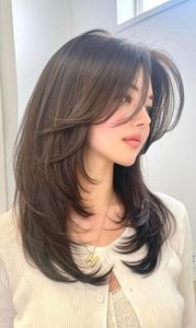 Elegant Pretty Girl with Beautiful Natural Curtain Bangs Hairstyle - Korean Style Hair Trend-1