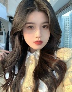 Elegant Pretty Girl with Beautiful Natural Curtain Bangs Hairstyle - Korean Style Hair Trend-0
