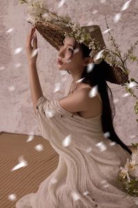 Ethereal Asian Beauty: Woman in Straw Hat with White Flowers-3
