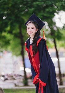 Beautiful Female Graduate Embraces Success at Graduation Ceremony-13