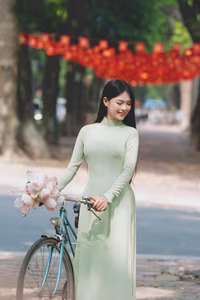XVG No.48: Vietnamese Ao Dai Beauty Graceful Girl with Flowers and Bicycle on Historic Street-10