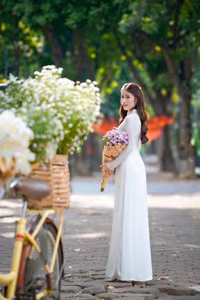 XVG No.55: Vietnamese Ao Dai Charm A Radiant Smile Embracing Youth and Tradition Under Golden Sun-0