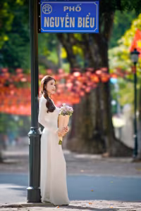 XVG No.55: Vietnamese Ao Dai Charm A Radiant Smile Embracing Youth and Tradition Under Golden Sun-6