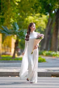 XVG No.55: Vietnamese Ao Dai Charm A Radiant Smile Embracing Youth and Tradition Under Golden Sun-4