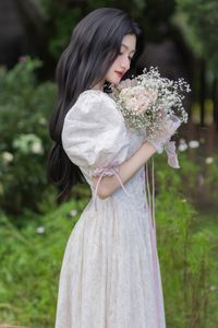 Elegant Beauty: Gentle Girl in Vintage Dress Amidst Dreamy Flower Garden-5