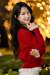 Radiant Smile Girl in Red Amidst Twinkling Lights: Warm Beauty for Festive Season-16