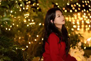 Radiant Smile Girl in Red Amidst Twinkling Lights: Warm Beauty for Festive Season-14