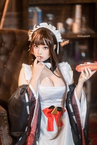 Coser Qiqi Nanako: Adorable Cow Maid Cosplay Captivates Fans-1
