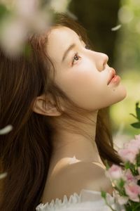 Gentle Beauty: Girl in Pristine White Dress with Pink Rose Bouquet Amidst Nature, Elegant Summer Style 1000019683-11