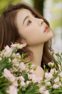 Gentle Beauty: Girl in Pristine White Dress with Pink Rose Bouquet Amidst Nature, Elegant Summer Style 1000019683-4