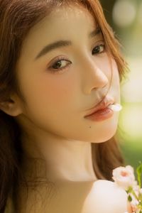 Gentle Beauty: Girl in Pristine White Dress with Pink Rose Bouquet Amidst Nature, Elegant Summer Style 1000019683-3