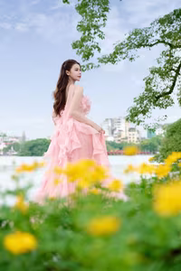 XVG No.24: Discover the Graceful Beauty of a Young Woman in Pink by Hoan Kiem Lake-1