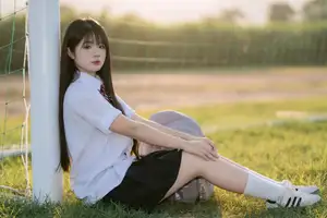 Youthful Schoolgirl in Uniform: Serene Golden Hour Beauty, a Glimpse into Nostalgic Student Life.-8