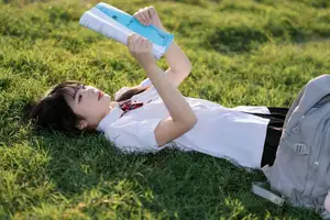Youthful Schoolgirl in Uniform: Serene Golden Hour Beauty, a Glimpse into Nostalgic Student Life.-16