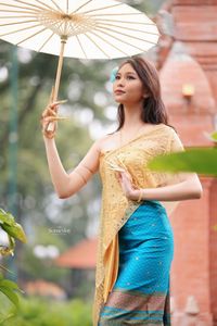 Traditional Vietnamese Beauty: Elegant Lady with Golden Lotus-10