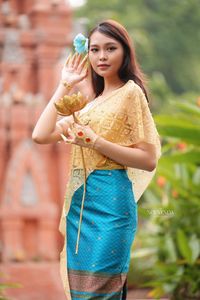 Traditional Vietnamese Beauty: Elegant Lady with Golden Lotus-13