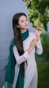 VGU No.172: Captivating Vietnamese Ao Dai Student in a Dreamy Moment, Showcasing Pure Grace Amidst Nature.-2