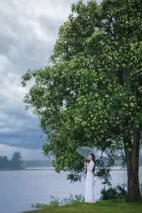 VGU No.172: Captivating Vietnamese Ao Dai Student in a Dreamy Moment, Showcasing Pure Grace Amidst Nature.-11