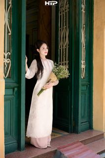 Gentle Beauty of Vietnamese Woman in Traditional Ao Dai at Hoan Kiem Lake-0