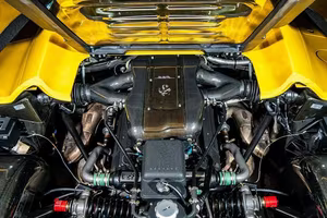 Vibrant Yellow Ferrari F50: Witness the World's Most Expensive Supercar Breaking Auction Records, Valued Over $9 Million!-6