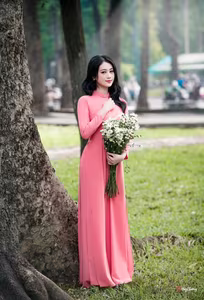 VGU No.18: Captivating Elegance A Young Woman in Pink Ao Dai-4