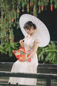 Elegant Ao Dai: Vietnamese Traditional Beauty in a Lush Garden-0