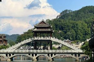 Discover Fenghuang Ancient Town: Serene boat ride, historic riverside charm.-5