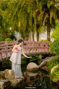 Graceful Young Woman in a Dreamy Garden: A Serene and Elegant Moment 1000025211-9