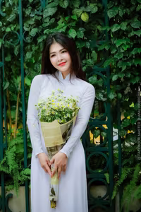 VGU No.87: Discover the captivating elegance of a Vietnamese girl in a pristine white Ao Dai.-5