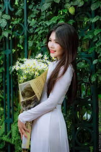 VGU No.87: Discover the captivating elegance of a Vietnamese girl in a pristine white Ao Dai.-1