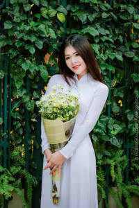 VGU No.87: Discover the captivating elegance of a Vietnamese girl in a pristine white Ao Dai.-6