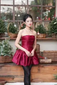 VGU No.187: Charming Woman in Red Dress Shines with Elegant Christmas Style. Discover Festive Fashion & Holiday Grace!-13
