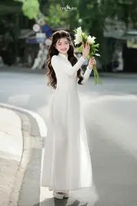 Vietnamese Schoolgirl Gracefully in Pure White Ao Dai Traditional Conical Hat and Lilies-3