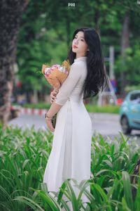 XVG No.45: Captivating Grace: Vietnamese Girl in White Ao Dai, Embracing Youthful Elegance-3