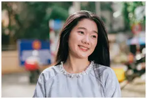 VGU No.193 Discover Youthful Charm: Radiant Smile of a Girl Amidst Fresh Fruit Market | 1000024596-14