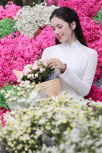 VGU No.147: Discover the enchanting grace of a Vietnamese girl in traditional Ao Dai amidst a vibrant flower market-4