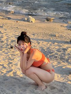 Bikini Goddess Flaunts Stunning Figure on Radiant Summer Beach-0