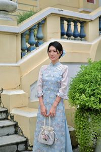 Radiant Vietnamese Beauty in Ao Dai with National Flag-13