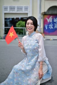 Radiant Vietnamese Beauty in Ao Dai with National Flag-0