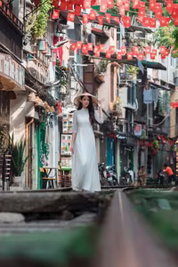VGU No.79: Elegant Vietnamese Ao Dai Beauty on Hanoi Train Street-4