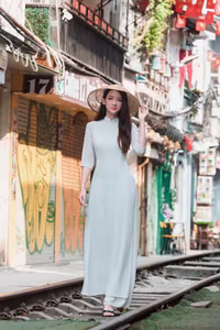 VGU No.79: Elegant Vietnamese Ao Dai Beauty on Hanoi Train Street-8